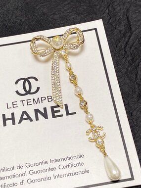 Chanel brooches